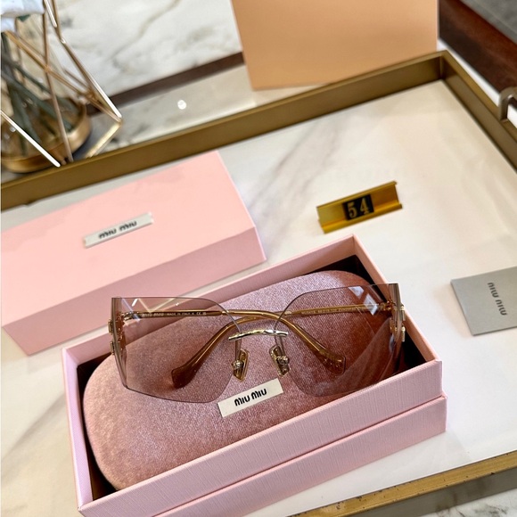 Miu Miu Rimless Sunglasses with Brown Gradient Lenses and Gold Accents